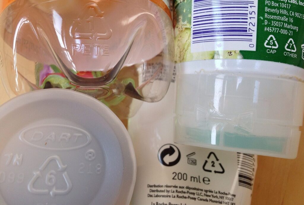 Recycling codes on a range of product packaging